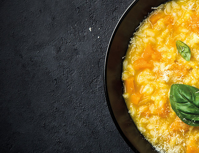 Squash risotto with basil tips